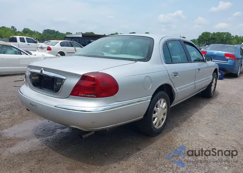 1999 Lincoln Continental z USA, uszkodzony, nr VIN 1LNHM97V7XY607937